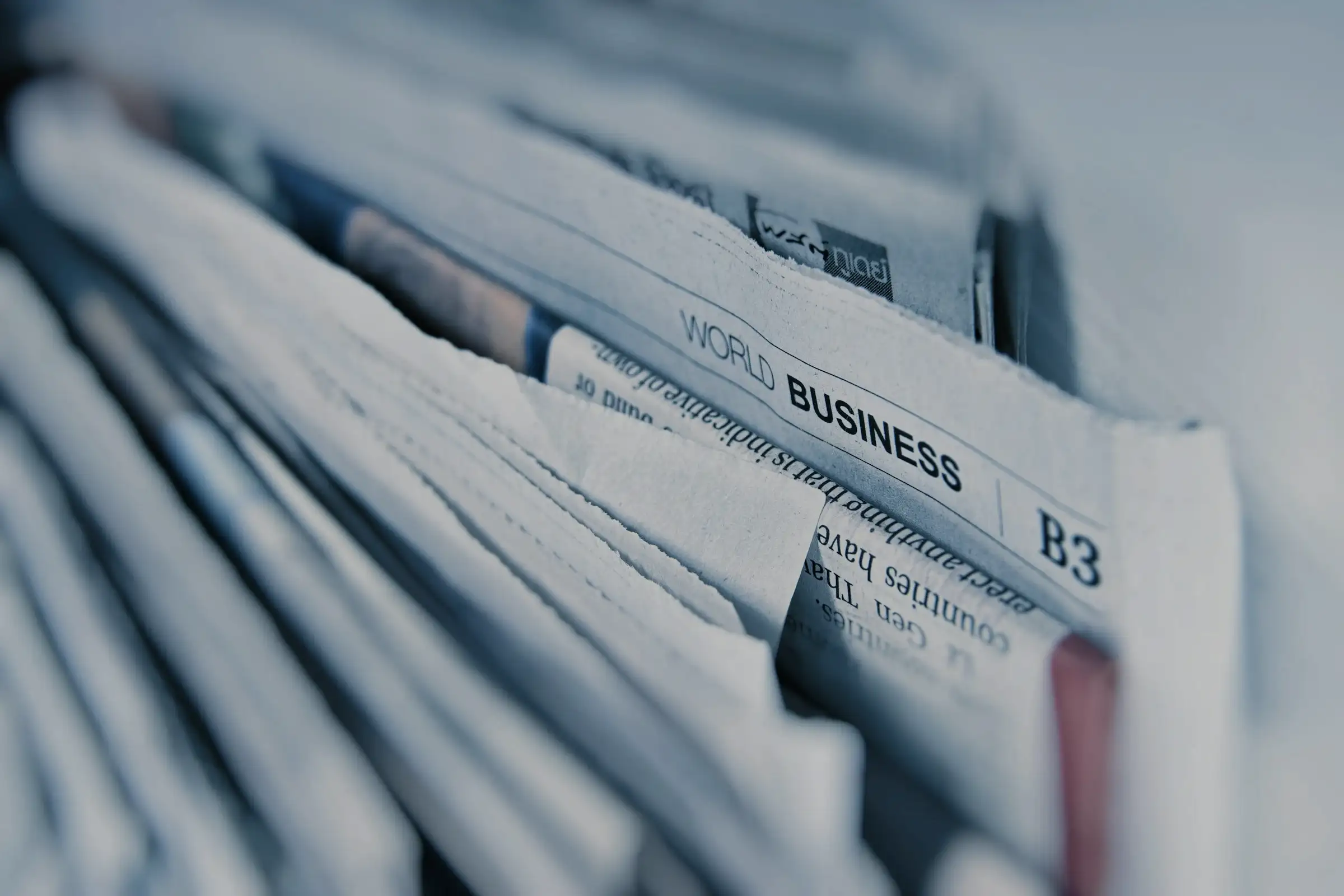 Stacked newspapers